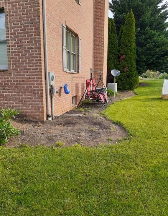 Cleared side yard prepared for landscaping